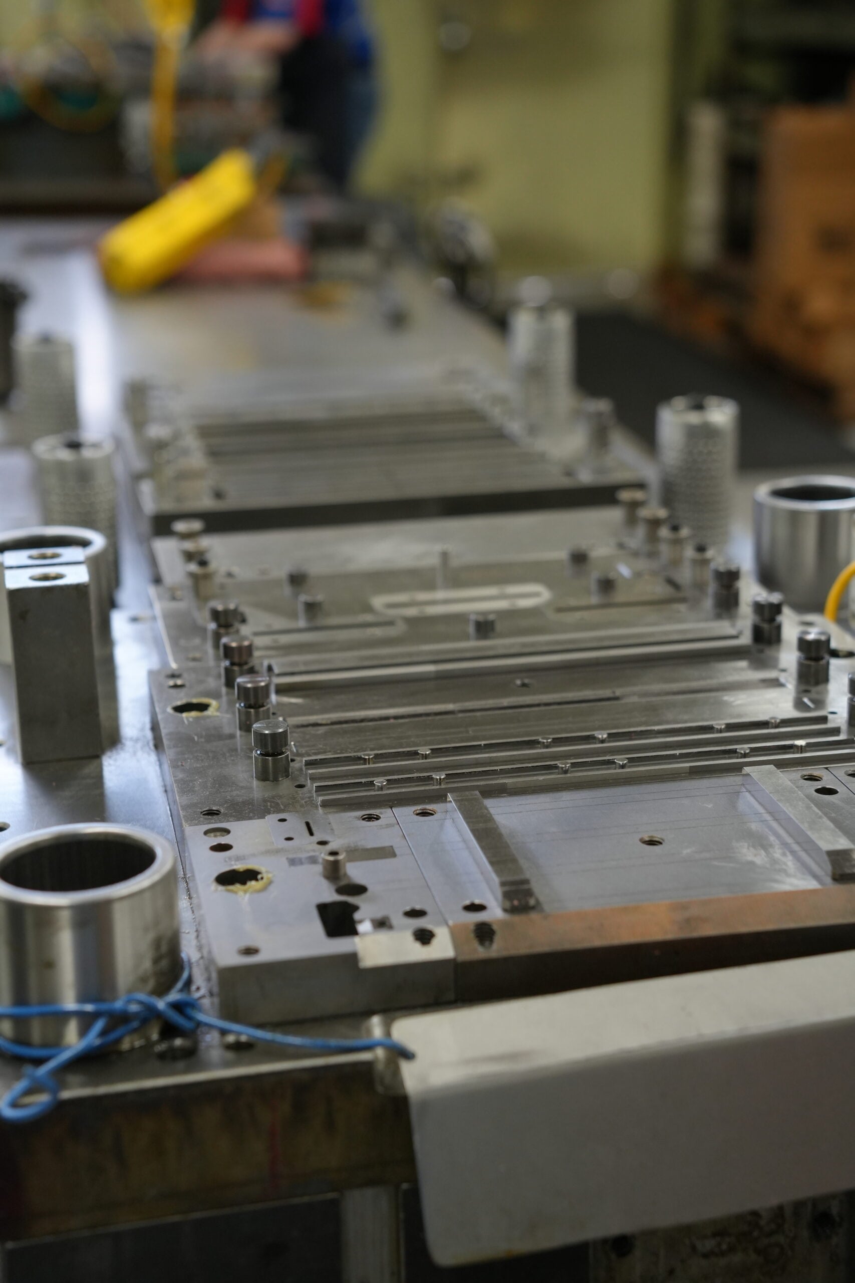 Progressive die stations with built-in quality features